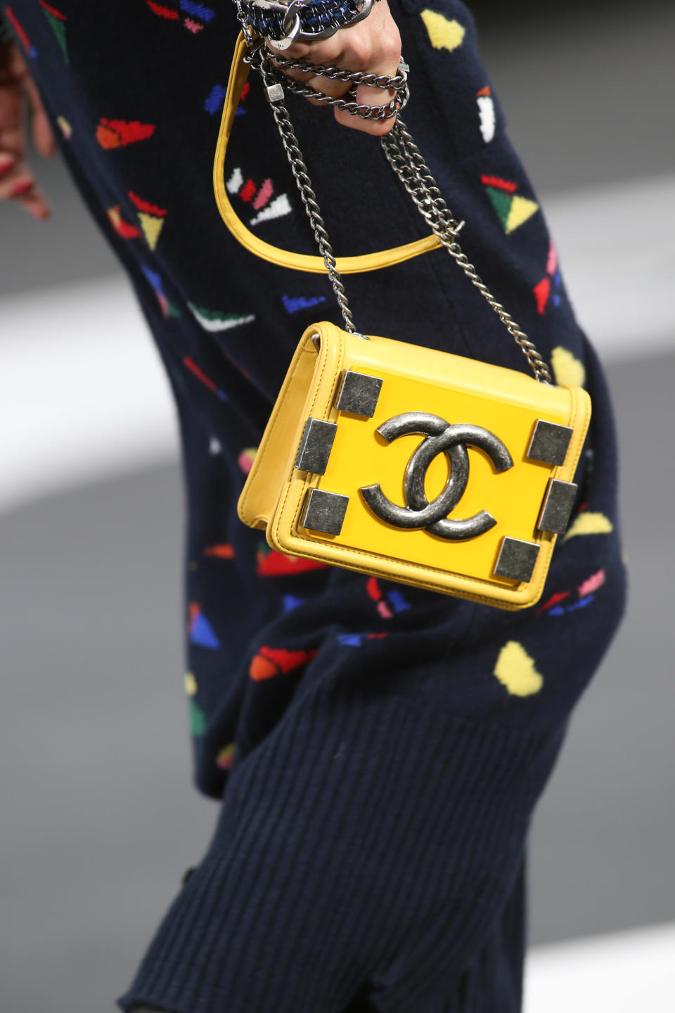 A model wears a creation by German fashion designer Karl Lagerfeld for Chanel's Fall/Winter 2013-2014 ready to wear collection, in Paris, Tuesday, March, 5, 2013. (AP Photo/Thibault Camus)