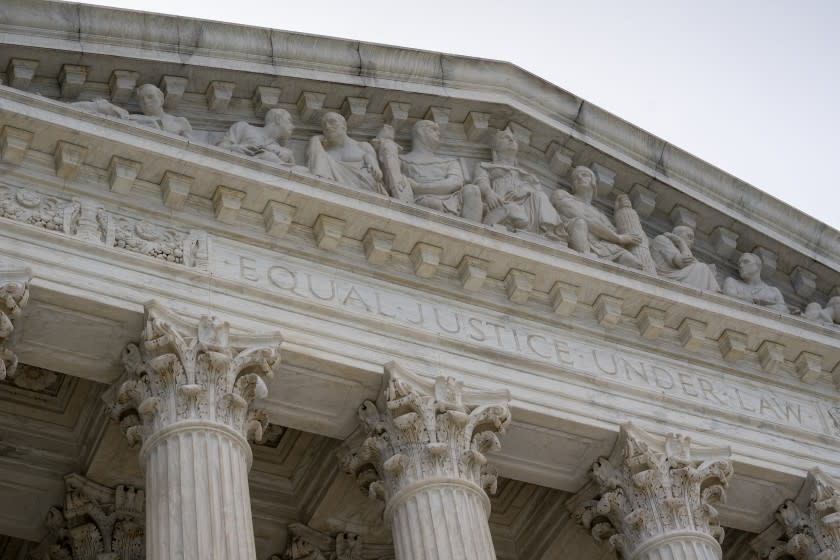 The Supreme Court is seen in Washington, early Monday, June 15, 2020. (AP Photo/J. Scott Applewhite)