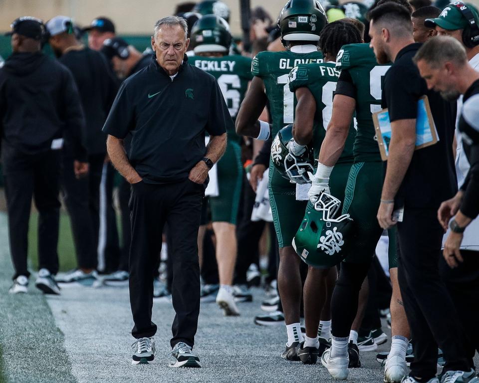 Former Michigan State coach Mark Dantonio walks along the sideline during the second half of MSU's 31-9 loss on Saturday, Sept. 23, 2023, in East Lansing.