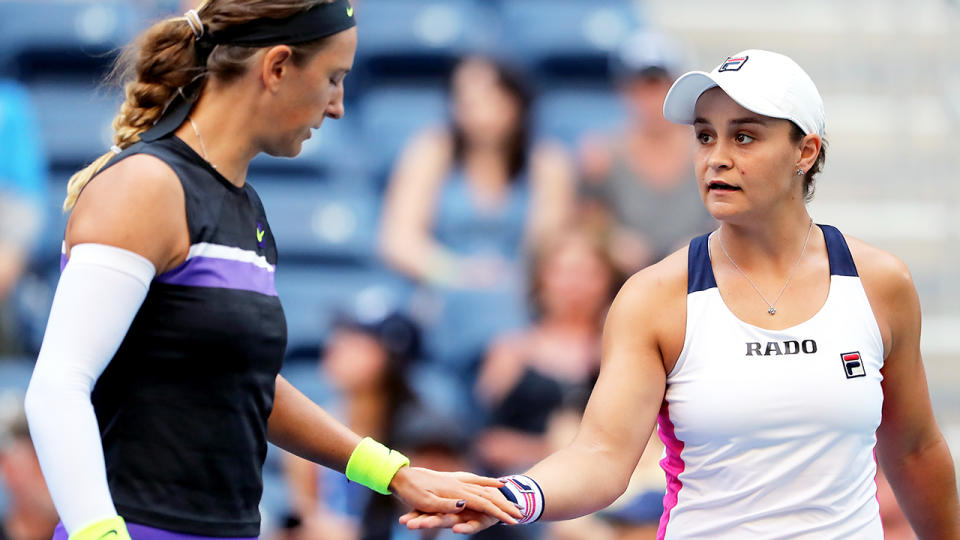 Ashleigh Barty and Victoria Azarenka react during their Women's Doubles quarterfinal match against Timea Babos and Kristina Mladenovic on day nine of the 2019 US Open. (Photo by Elsa/Getty Images)