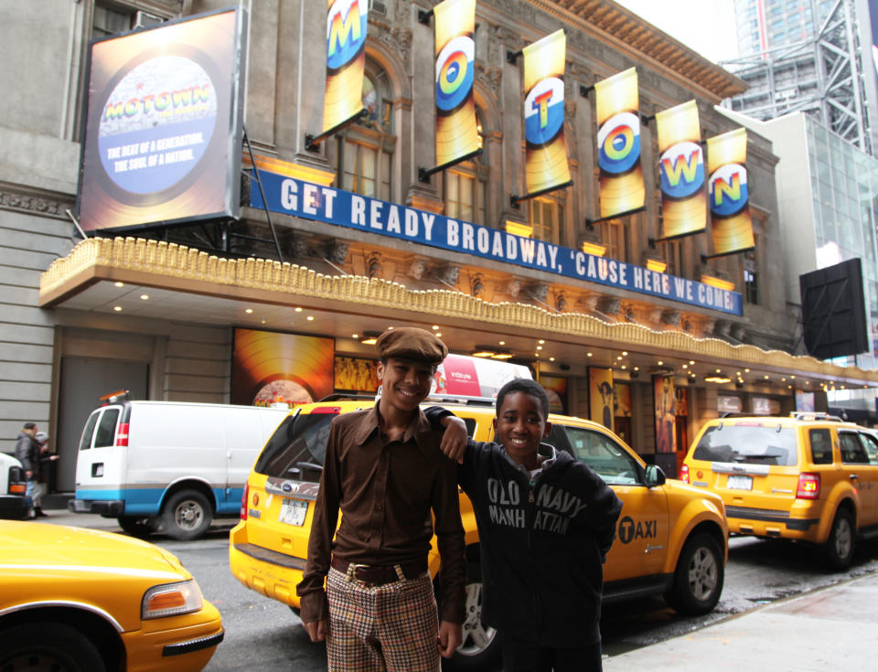 This March 25, 2013 photo shows actors Jibreel Mawry, left, and Raymond Luke Jr. posing outside the Lunt-Fontanne Theatre in New York, where their show "Motown: The Musical," is playing. The two 12-year-olds are alternating taking on the roles of young Michael Jackson, young Stevie Wonder and a young Berry Gordy. (AP Photo/Mark Kennedy)