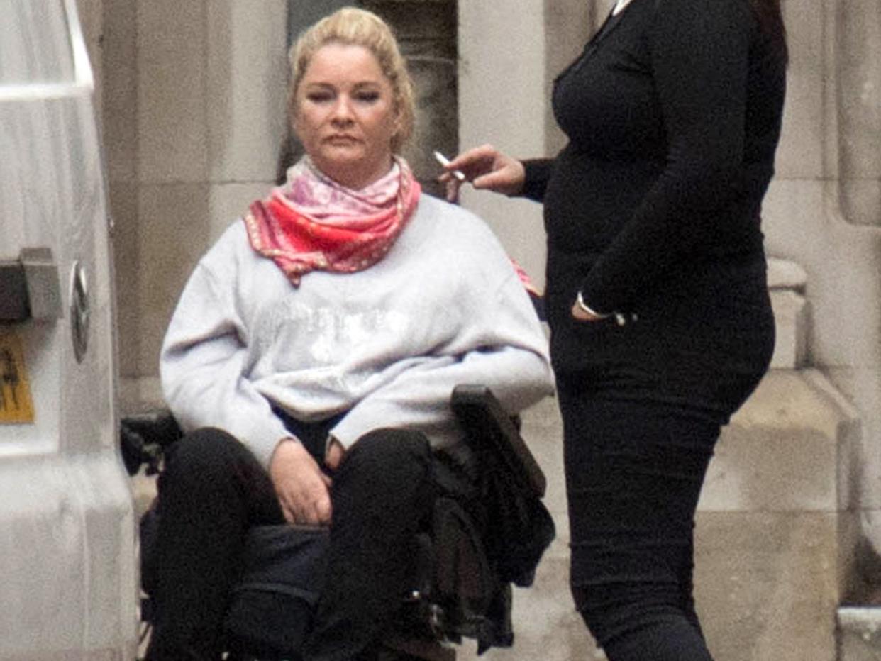 Claire Busby, (left) outside the High Court in London, where she is suing Beds Are Uzzz, for seven-figure damages: PA