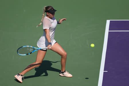 Mar 20, 2018; Key Biscayne, FL, USA; Amanda Anisimova of the United States hits a forehand against Qiang Wang of China (not pictured) on day one of the Miami Open at Tennis Center at Crandon Park. Anisimova won 6-3, 1-6, 6-2. Geoff Burke-USA TODAY Sports