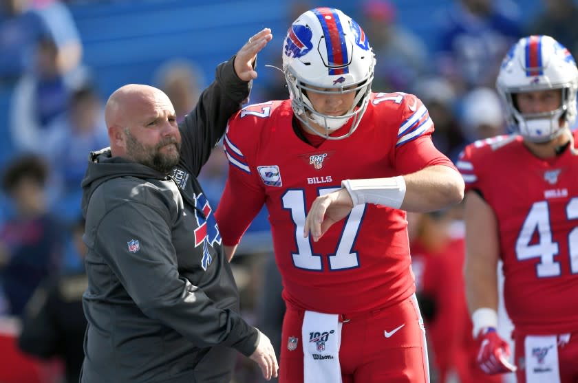 FILE - In this Oct. 20, 2019, file photo, Buffalo Bills offensive coordinator Brian Daboll, left.