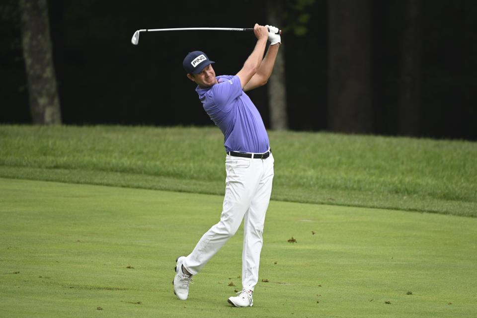 Harris English hits from the second fairway during the third round of the BMW Championship golf tournament, Saturday, Aug. 28, 2021, at Caves Valley Golf Club in Owings Mills, Md. (AP Photo/Terrance Williams)