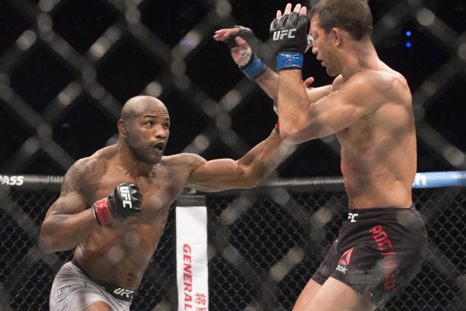 February 10, 2018; Perth, Australia; Yoel Romero moves in with a hit against Luke Rockhold during UFC 221 at Perth Arena. Mandatory Credit: Stewart Allen-USA TODAY Sports