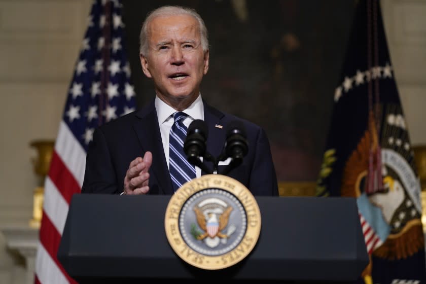 President Joe Biden delivers remarks on climate change and green jobs, in the State Dining Room of the White House, Wednesday, Jan. 27, 2021, in Washington. (AP Photo/Evan Vucci)