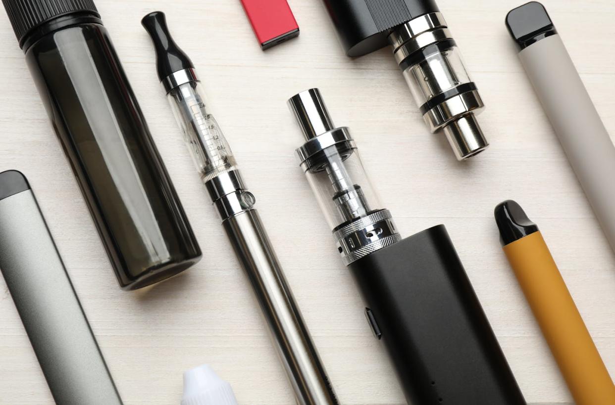 Prior to the FDA's authorization of the four new products, the agency had denied applications for menthol-flavored vapes. <a href="https://www.gettyimages.com/detail/photo/different-electronic-cigarettes-on-white-wooden-royalty-free-image/1415564652?phrase=+e-cigarettes&adppopup=true" rel="nofollow noopener" target="_blank" data-ylk="slk:Liudmila Chernetska/iStock via Getty Images;elm:context_link;itc:0;sec:content-canvas" class="link ">Liudmila Chernetska/iStock via Getty Images</a>