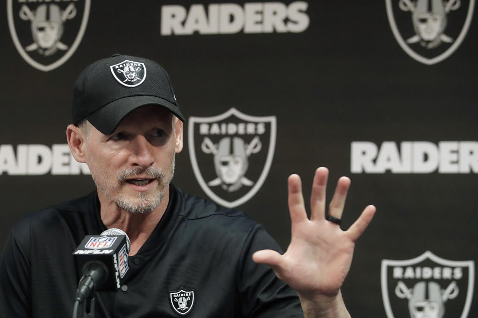 Oakland Raiders general manager Mike Mayock speaks during a news conference at the team's NFL football facility in Alameda, Calif. Star receiver Antonio Brown is not with the Oakland Raiders four days before the season opener amid reports he could be suspended over a confrontation with general manager Mike Mayock. Mayock issued a brief statement at the beginning of practice Thursday, Sept. 5, 2019, saying that Brown wasn't at the Raiders facility and won't be practicing a day after Brown posted a letter from the GM on social media detailing nearly $54,000 in fines.(AP Photo/Jeff Chiu, File)