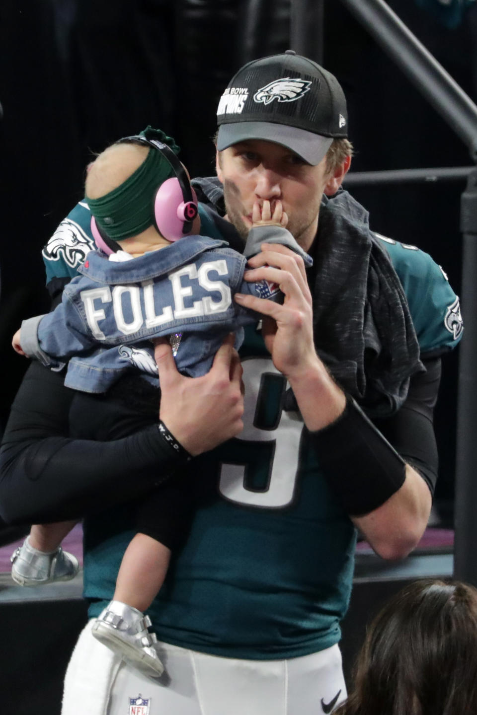 <p>Nick Foles #9 of the Philadelphia Eagles celebrates with his daughter Lily Foles after his 41-33 victory over the New England Patriots in Super Bowl LII at U.S. Bank Stadium on February 4, 2018 in Minneapolis, Minnesota. The Philadelphia Eagles defeated the New England Patriots 41-33. (Photo by Streeter Lecka/Getty Images) </p>