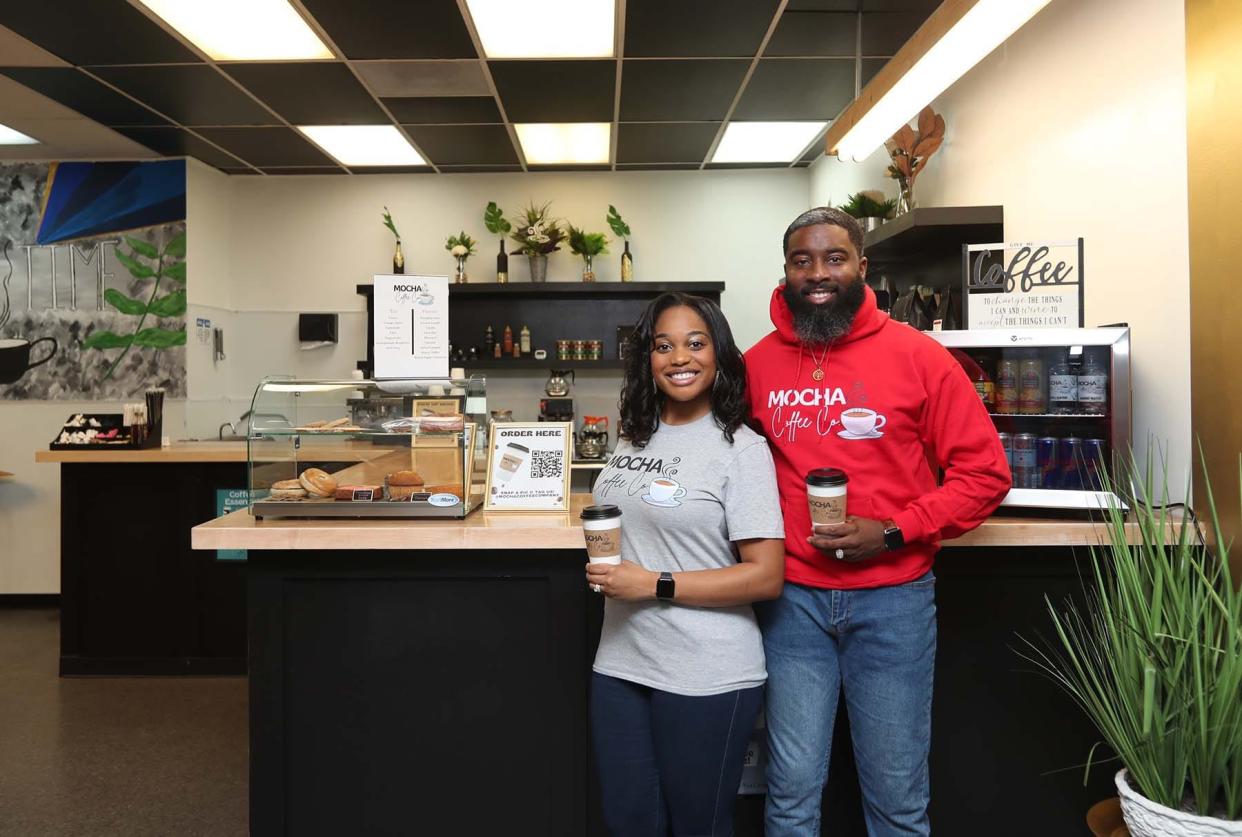 Brittany and Dre Wiley, owners of the Mocha Coffee Co., inside the recently opened coffee shop in Macedonia.