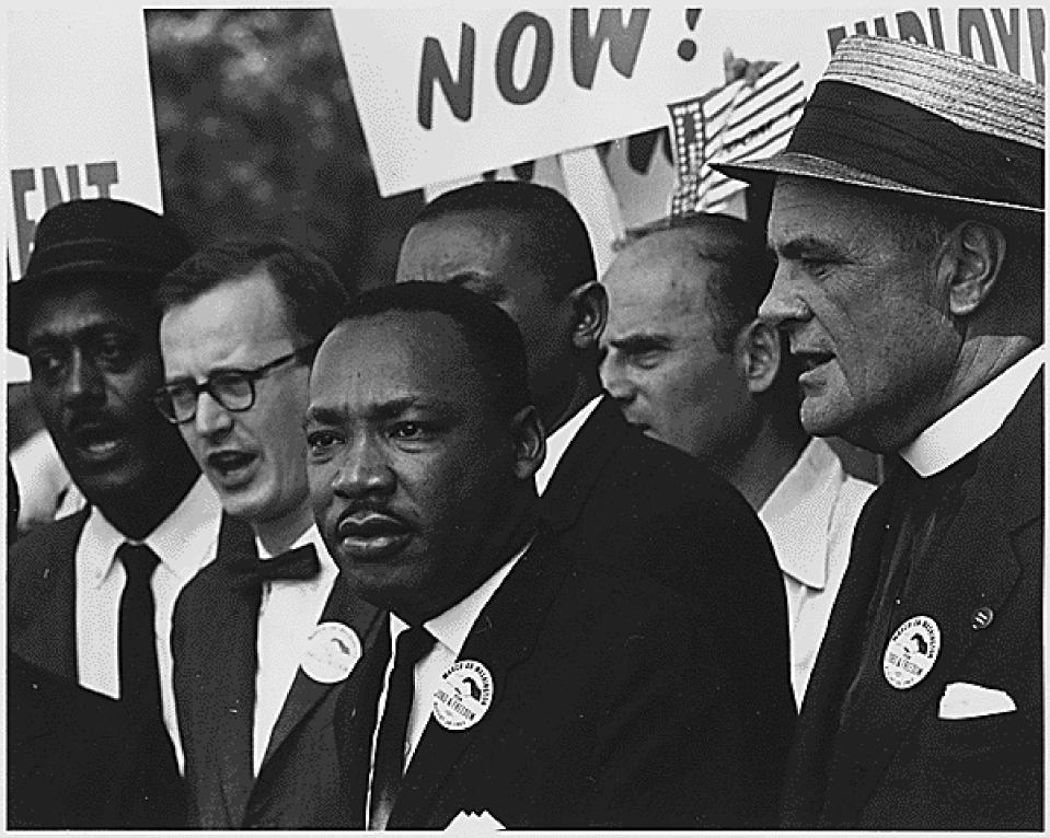 Leaders of the 1963 March on Washington for jobs and Freedom raise their hands together as they move along Constitution Avenue in Washington, D.C. on August 28, 1963. Some of the leaders in the march, from left to right, include John Lewis, Mathew Ahmann, Roy Wilkins, Dr. King, Rabbi Joachim Prinz, A. Philip Randolph, and Whitney Young. - Credit: Arnie Sachs - CNP / MEGA