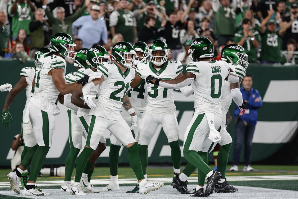 New York Jets safety Ashtyn Davis (21) celebrates with teammates after intercepting a pass against the Kansas City Chiefs during the fourth quarter of an NFL football game, Sunday, Oct. 1, 2023, in East Rutherford, N.J. (AP Photo/Adam Hunger)