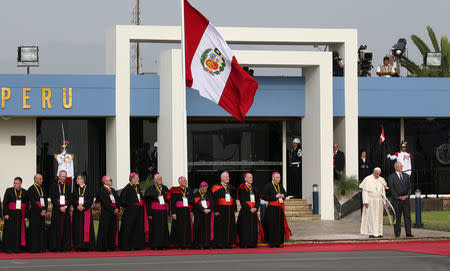 Pope Francis is greeted by Peru's President Pedro Pablo Kuczynski as he arrives in Lima, Peru, January 18, 2018. REUTERS/Alessandro Bianchi