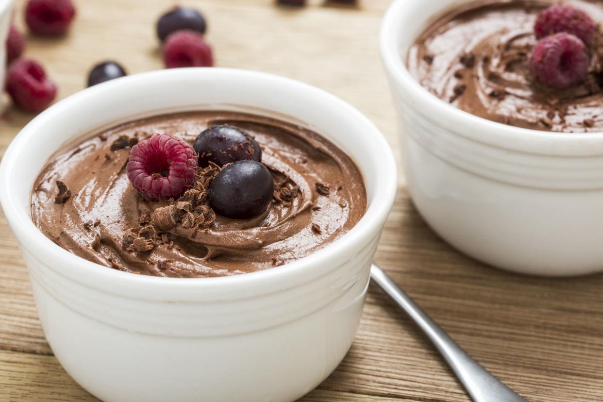 Chocolate mousses topped with berries