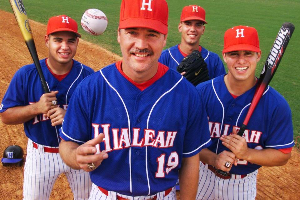 2/11/02 - Photo by Jared Lazarus/Herald staff - Defending state champs Hialeah High hope for one last run under Coach Richard Bielski, who is retiring after this season. From left, are seniors Jorge Mico (catcher), Camilo Vazquez (left-handed pitcher) and Yahmed Yema (centerfielder). Photo taken during practice at Milander Park on Monday. Jared Lazarus/Miami Herald File