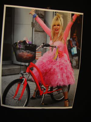 The Spring 2011 Betsey Johnson show was inspired by bicycles. She showed footage of herself with her daughter and grandkids riding around New York City, and the runway was designed to look like a road with traffic cones. The opening song: Queen's &quo