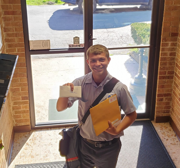 Ohio postal worker Kyle West has been delivering essential goods to people on his route. (Photo: Courtesy of Kyle West)