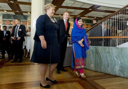 Norway's Prime Minister Erna Solberg (L-R), Norway's Foreign Minister Borge Brende and Nobel Peace Prize winner Malala Yousafzai participate in the Oslo Summit on Education for Development at Oslo Plaza in Oslo, Norway July, 7, 2015.