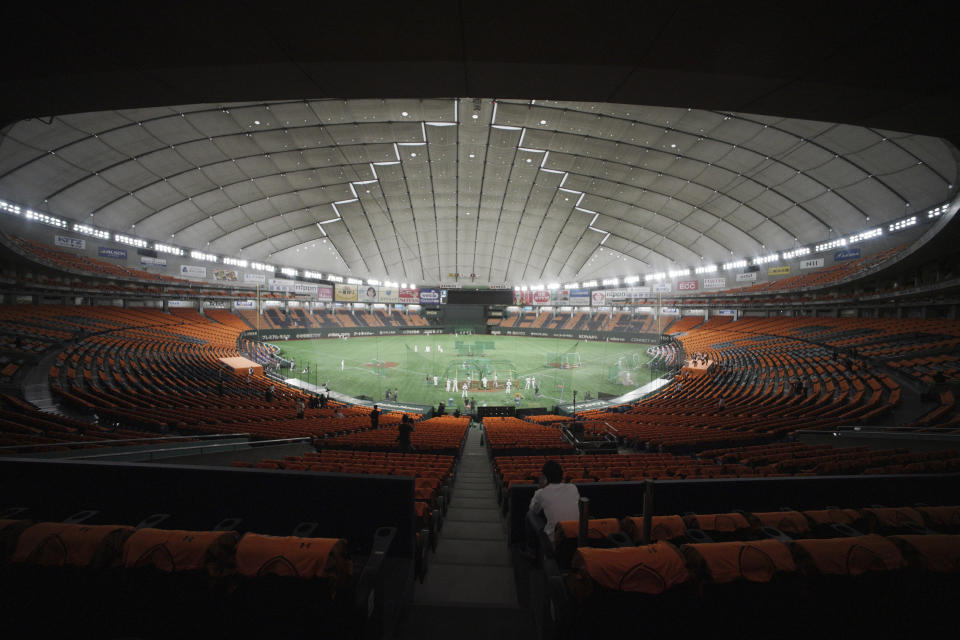 Tokyo dome is seen during a practice session prior to an opening baseball game between the Yomiuri Giants and the Hanshin Tigers at Tokyo Dome in Tokyo Friday, June 19, 2020. Japan's professional baseball regular season will be kicked off in the day without fans in attendance because of the threat of the spreading coronavirus. (AP Photo/Eugene Hoshiko)