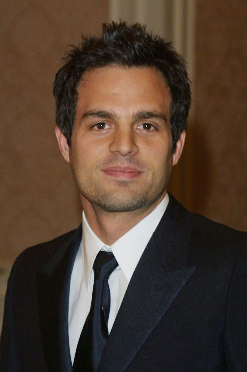 <p>Before he was the Hulk, Mark Ruffalo's short and spiky brown hair was part of his signature look. </p>