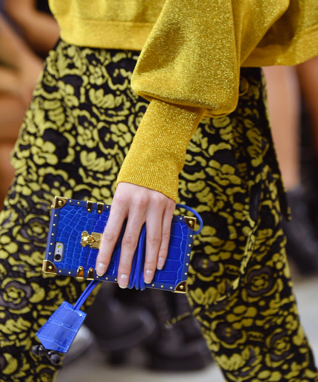 The Petite Malle clutch, spotted on the streets of Milan Fashion