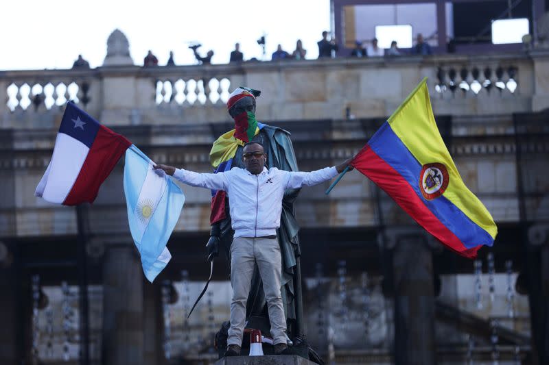 Demonstrators take part in a protest as a national strike continues in Bogota