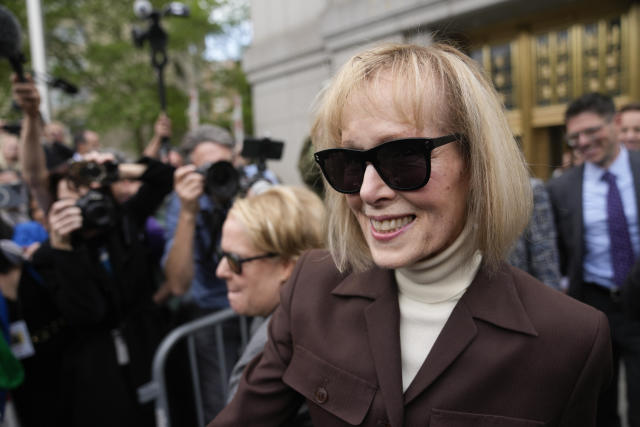 FILE - E. Jean Carroll walks out of federal court May 9, 2023, in New York. This week, jurors in a New York civil case said they believed that Donald Trump sexually assaulted writer E. Jean Carroll in a dressing room in the 1990s, making him the first U.S. president found liable by a jury in a sexual battery case. The panel awarded her $5 million in damages. (AP Photo/Seth Wenig, File)