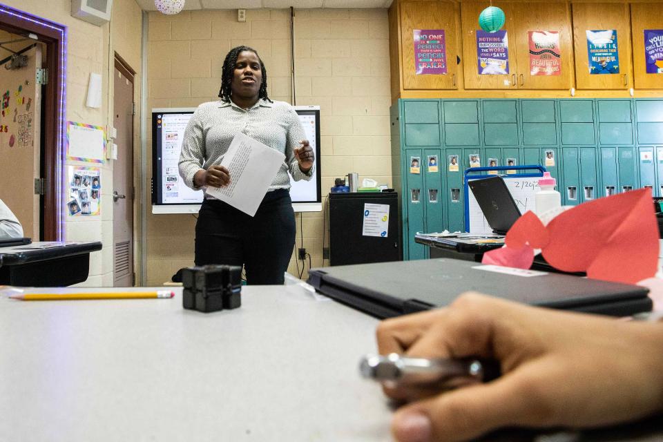 Paraprofessional Tameka Mays gives instructions to the students of class N-1 at George Read Middle School in New Castle, Tuesday, Feb. 20, 2024.