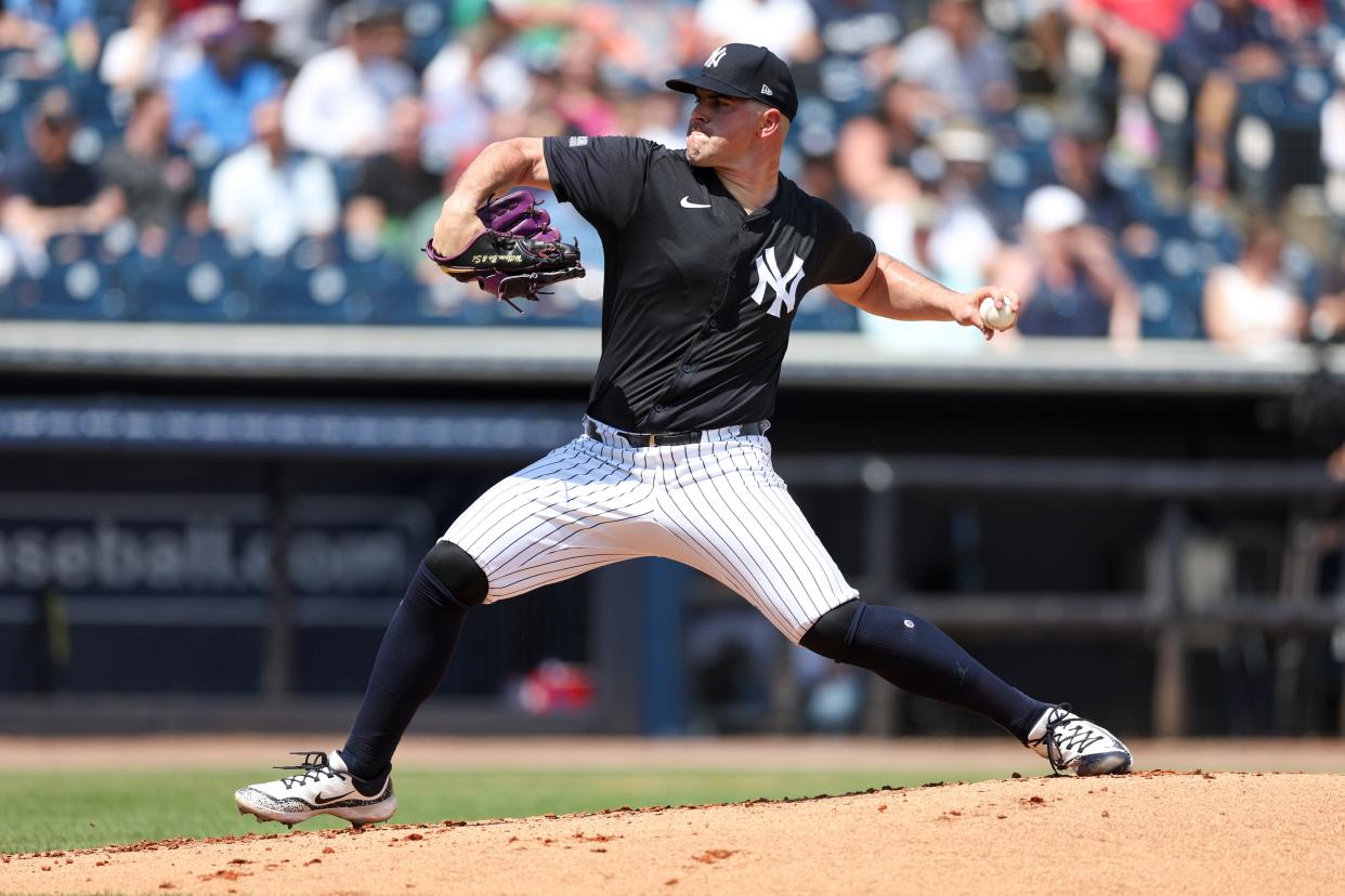 Mar 18, 2024; Tampa, Florida, USA; New York Yankees starting pitcher Carlos Rodon (55) throws a pitch against the Philadelphia Phillies in the second inning at George M. Steinbrenner Field. Mandatory Credit: Nathan Ray Seebeck-USA TODAY Sports