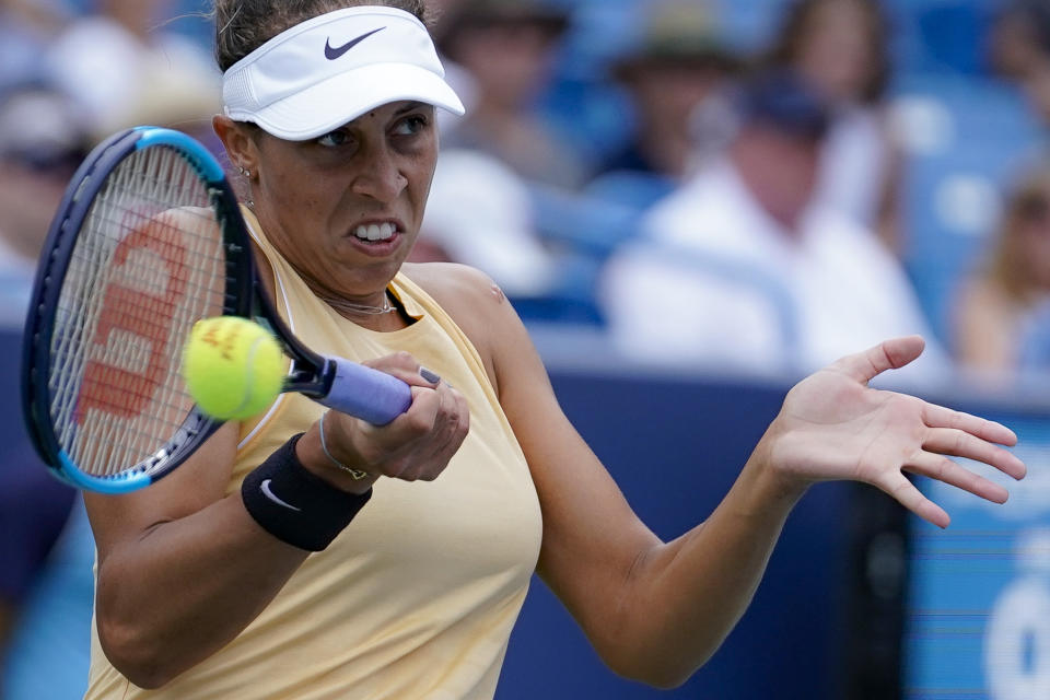 Madison Keys, of the United States, returns to Sofia Kenin, also of the United States, during the Western & Southern Open tennis tournament Saturday, Aug. 17, 2019, in Mason, Ohio. (AP Photo/John Minchillo)