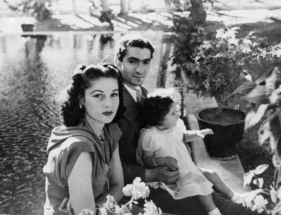 Iran's last king, Shah Mohammad Reza Pahlevi, center, his wife, Queen Fawzia, left, and Princess Shahnaz in the grounds of their palace near Tehran, in 1942.
