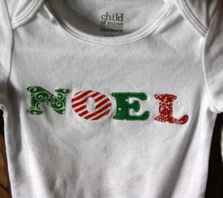 <div class="caption-credit"> Photo by: Etsy</div><b>Noel</b> <br> Personalization at its best! You can customize this bodysuit with any saying, word or name, choosing from a huge selection of fabrics. <br> <i><a href="http://www.disneybaby.com/blog/holiday-themed-bodysuits-for-baby/#slide12" rel="nofollow noopener" target="_blank" data-ylk="slk:Get it here;elm:context_link;itc:0;sec:content-canvas" class="link ">Get it here</a></i> <br>