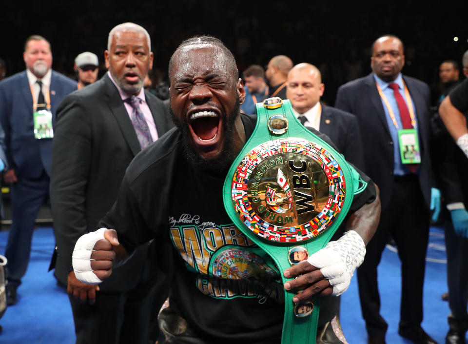 NEW YORK, NEW YORK - MAY 18:  Deontay Wilder celebrates after knocking out Dominic Breazeale in the first round during their bout for Wilder's WBC heavyweight title at Barclays Center on May 18, 2019 in New York City. (Photo by Al Bello/Getty Images)