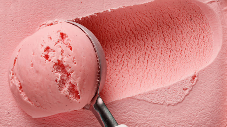 Pink ice cream with scoop