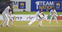West Indies batsman Veerasammy Permaul is bowled out during the day three of their second test cricket match with Sri Lanka in Galle, Sri Lanka, Wednesday, Dec. 1, 2021. (AP Photo/Eranga Jayawardena)