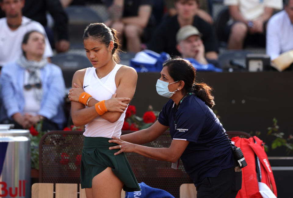 Emma Raducanu, pictured here receiving treatment during a medical timeout at the Italian Open.