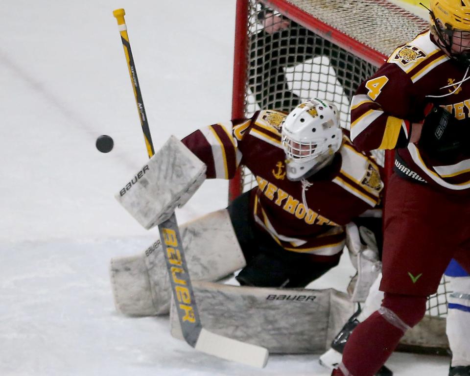 Weymouth goalie Grady Salfity makes a save during first period action of their game in the Round of 32 game in the Division 1 state tournament at Zapustas Ice Arena in Randolph on Wednesday, March 1, 2023.