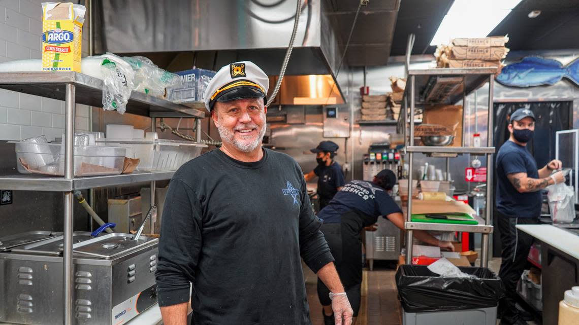 Owner Mario Palazon in the kitchen of the original FreshCo Fish Market & Grill in Kendall.