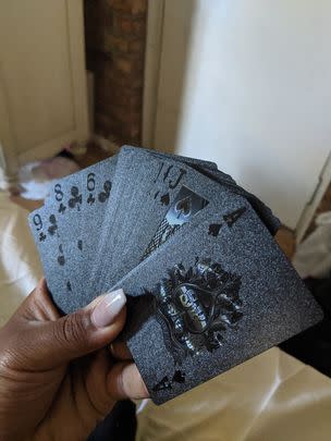 A set of black foil playing cards