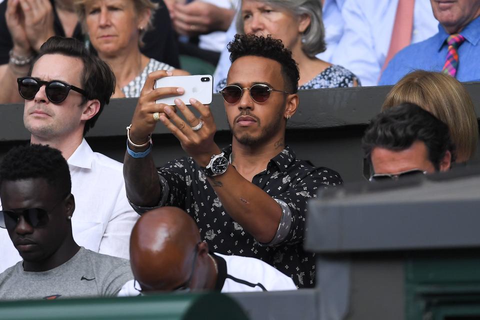 Centre Court speed merchant: Lewis Hamilton at Wimbledon last week