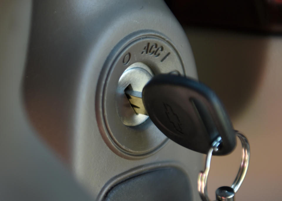 FILE - This Tuesday, April 1, 2014 file photo shows a key in the ignition switch of a 2005 Chevrolet Cobalt in Alexandria, Va. Texas attorney Robert Hilliard has sued General Motors on behalf of 658 people injured or killed in crashes allegedly caused by faulty ignition switches. The lawsuit filed Tuesday, July 29, 2014 in U.S. District Court in Manhattan names 29 people who were killed and 629 who were hurt. (AP Photo/Molly Riley, File)