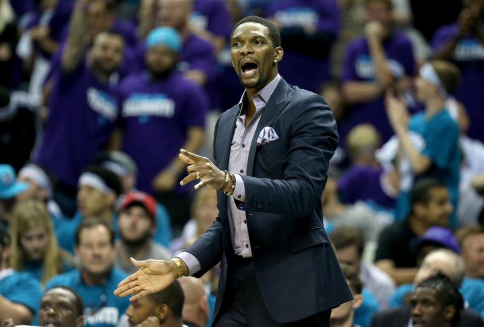 Chris Bosh remains on the bench, but that's not where he wants to be. (Streeter Lecka/Getty Images)