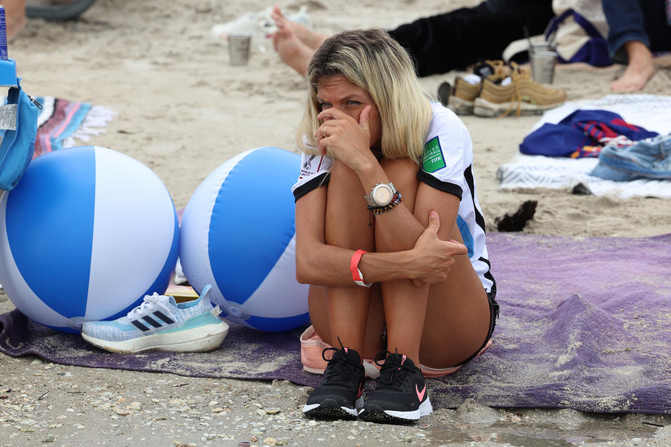 MIAMI, FL - DECEMBER 18:  An Argentina soccer fan watches as her team plays against France during the Haig Club’s Stadium in the Sand Ballyhoo Media World Cup watch party at the Virginia Key Beach Park on December 18, 2022 in Miami, Florida. Argentina beat France in the 2022 World Cup final at Lusail Stadium in Lusail City, Qatar. (Photo by Joe Raedle/Getty Images)