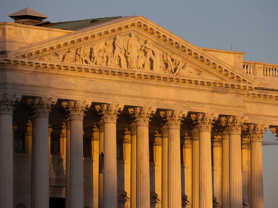 The Senate side of the U.S. Capitol at sunrise on Monday, Jan. 20, 2020, in Washington. The impeachment trial of President Donald Trump will resume in the U.S. Senate on Tuesday.  (AP Photo/Jon Elswick)