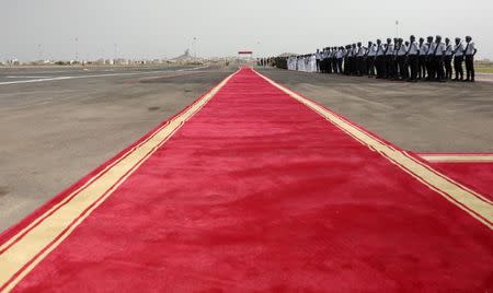 A Guard of Honour waits by the red carpet prior to the arrival of Chinese President Xi Jinping at the Leopold Sedar Senghor International Airport at the start of his visit to Dakar, Senegal July 21, 2018. REUTERS/Mikal McAllister