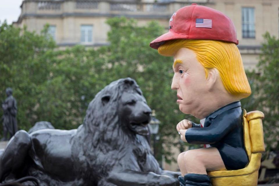 A Trump effigy was created during protests in June, showing the president tweeting while sitting on a golden toilet (In Pictures via Getty Images)