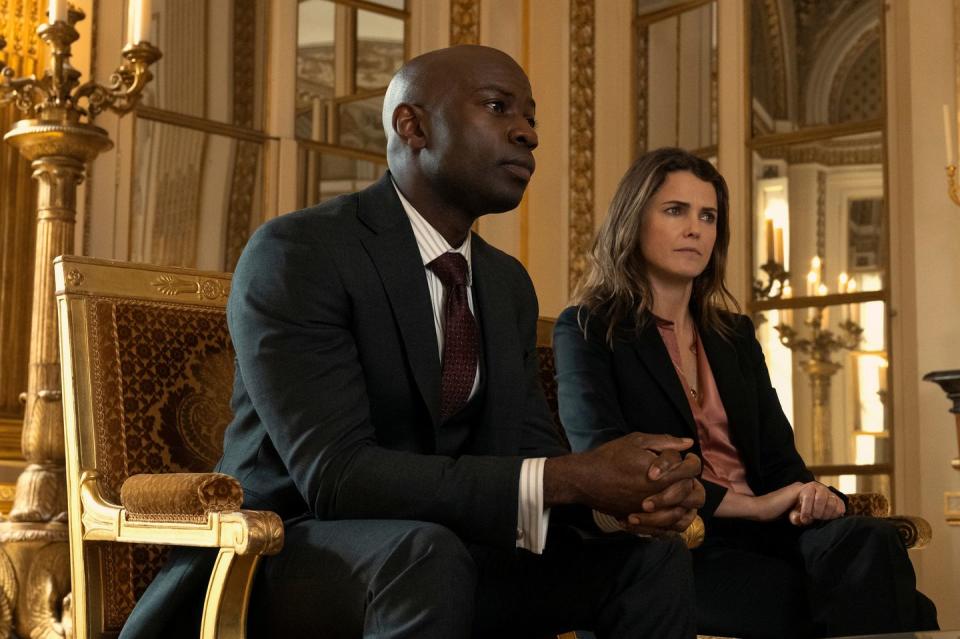 david gyasi as austin dennison and keri russell as kate wyler