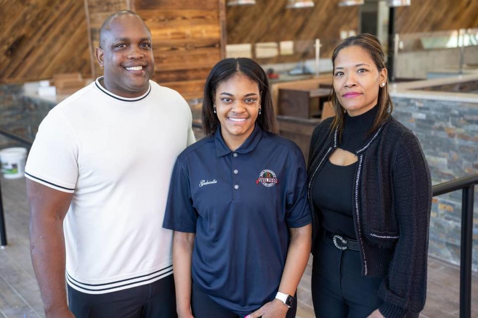 Shawn Morrison, Gabby Morrison and Kiana Morrison at the new Nana Morrison’s Soul Food location in northwest Charlotte.