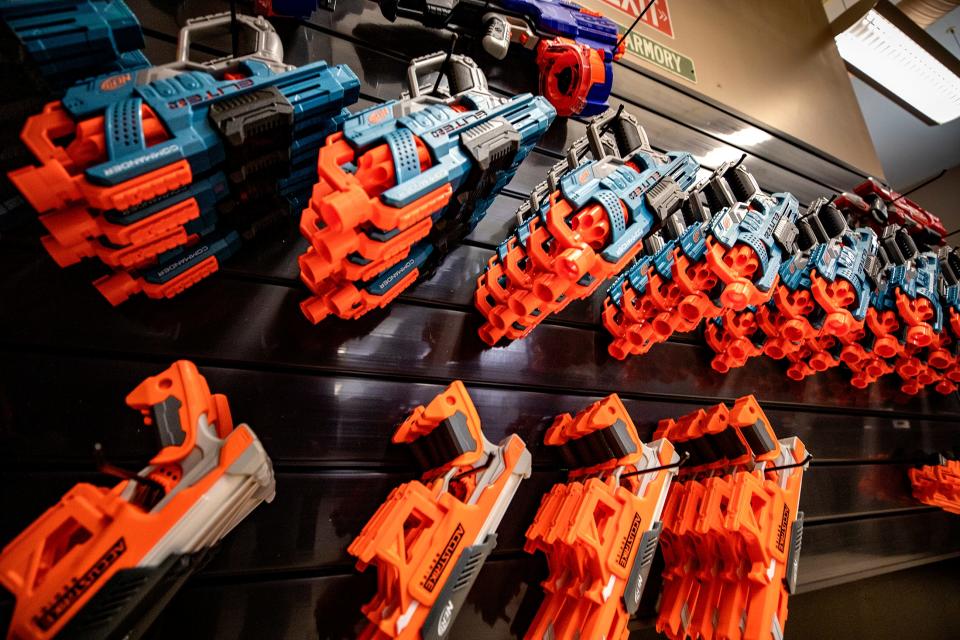 A large selection of dart guns at Dart World Gaming Arena downtown in Lakeland Fl. Friday January 28 ,  2022. Dart Arena to offer Nerf gun battles for families and parties. The arena is In a historic building formerly RP Funding offices. Loft is above the Dart World. ERNST PETERS/ THE LEDGER